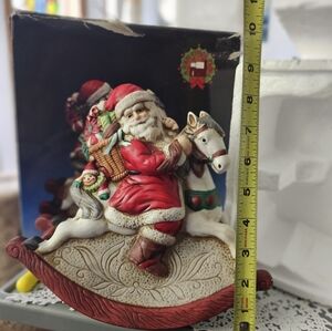 Vintage Christmas Music Box Santa on Rocking Horse with Basket of Toys.